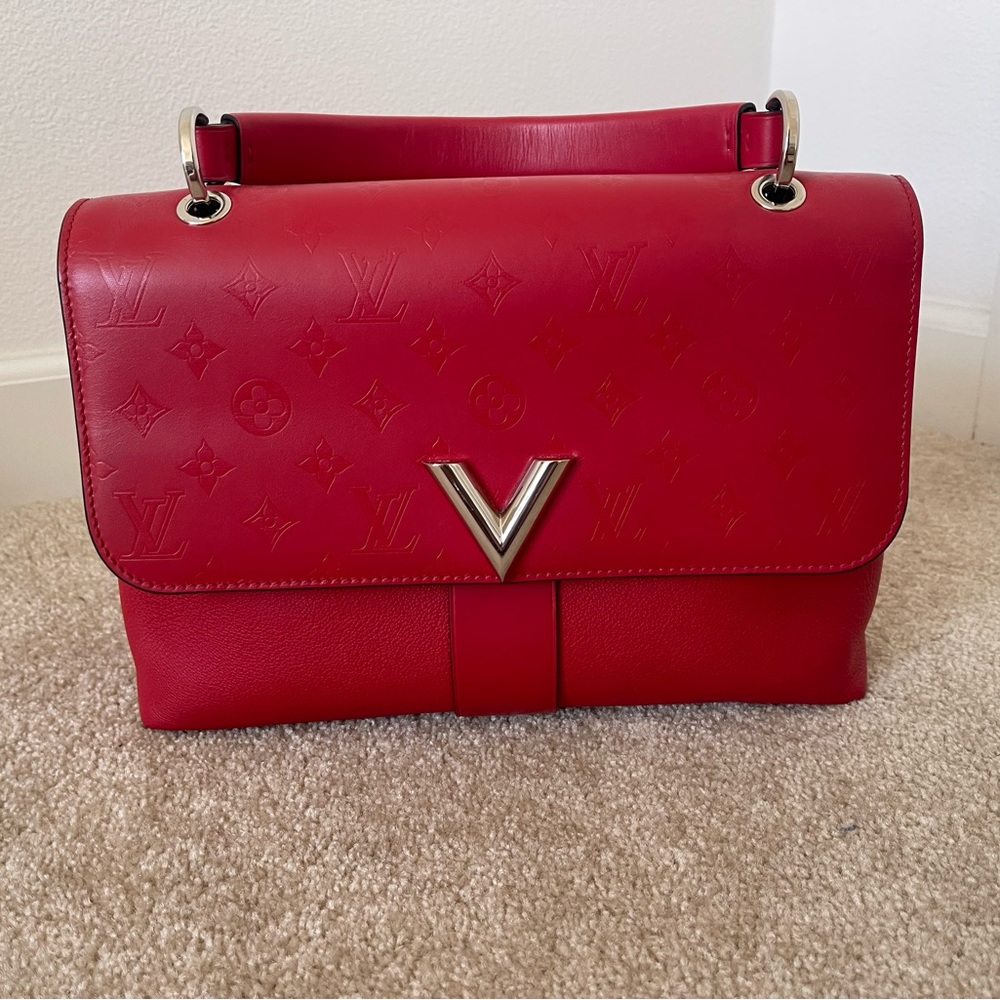 Louis Vuitton calfskin monogram very one handle rubis red.